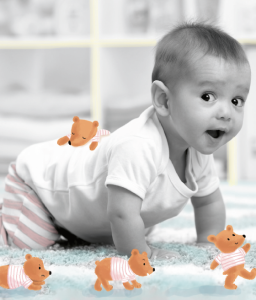 Photo bébé qui marche avec des oursons illustrés autour.